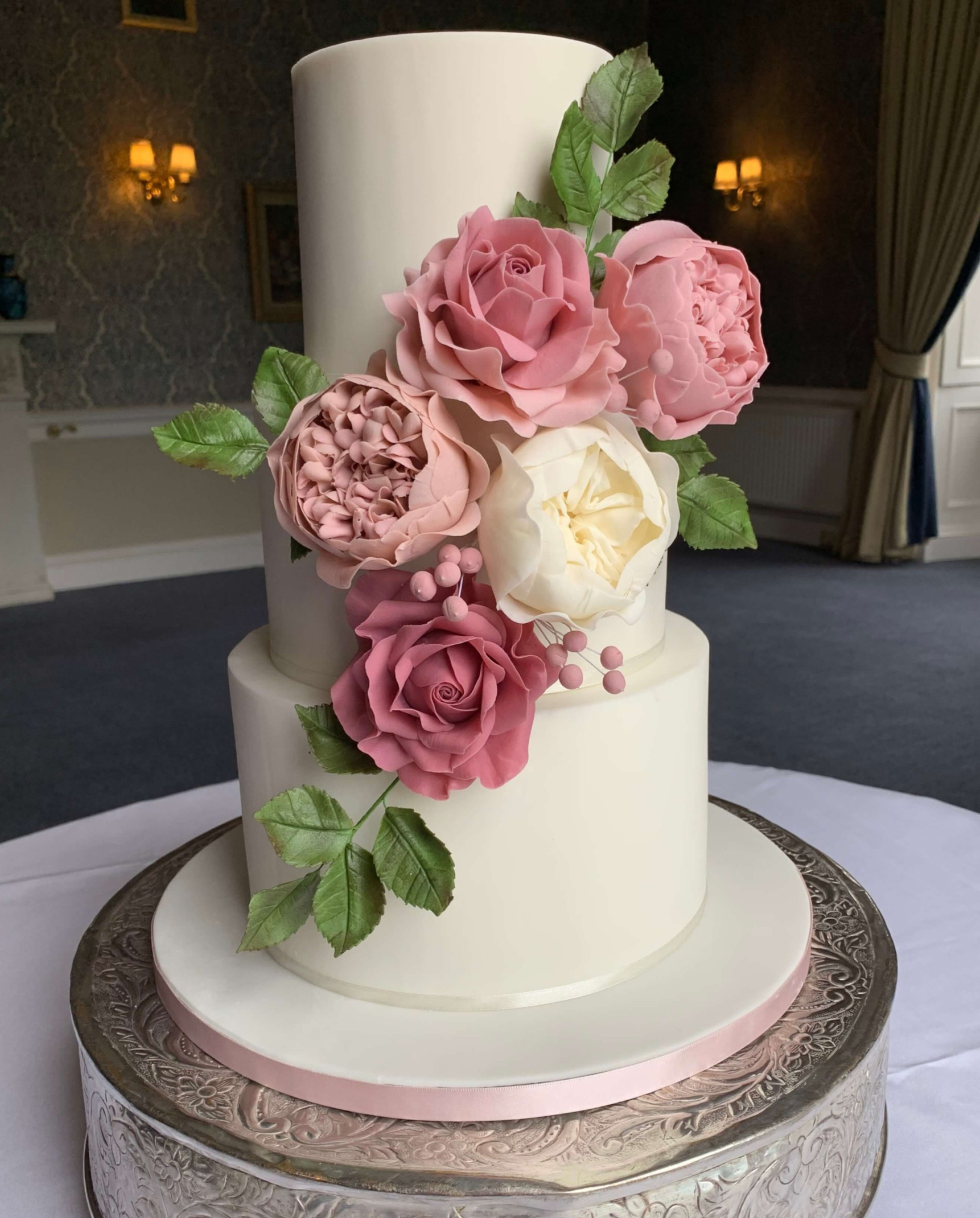 Beautiful 2 tier wedding cake with sugar flowers